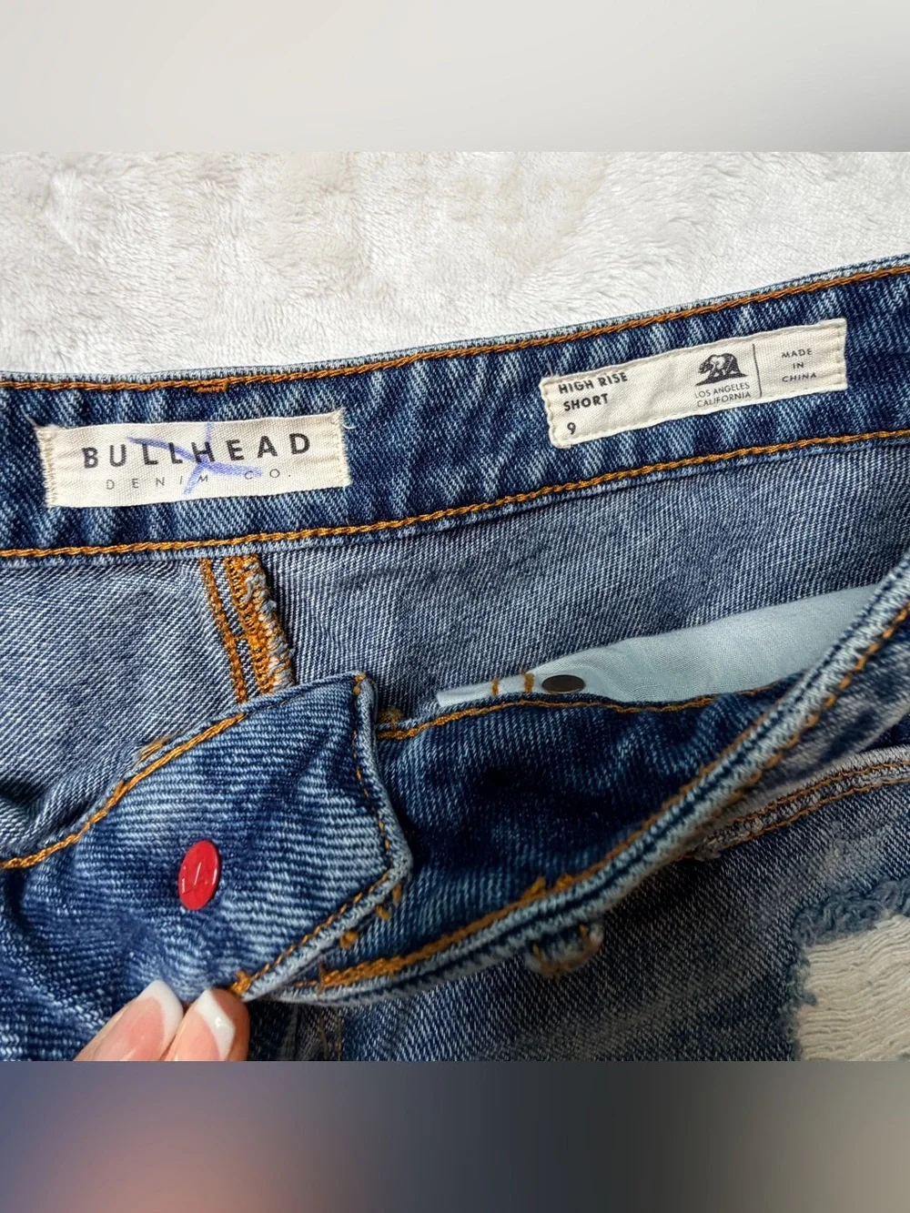 BullHead denim Co. Women's Distressed Blue Denim cutoff  mid/high rise Shorts.